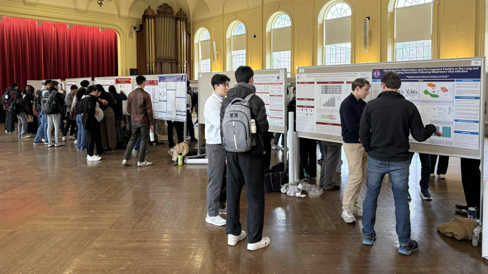 Students presenting posters during Session I in Alumnae Hall