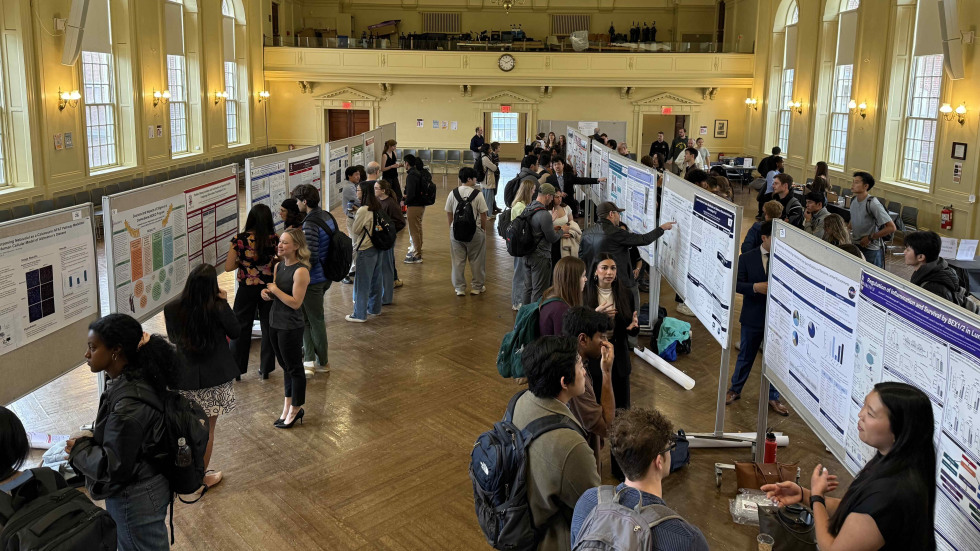 Students presenting posters during Session I in Alumnae Hall