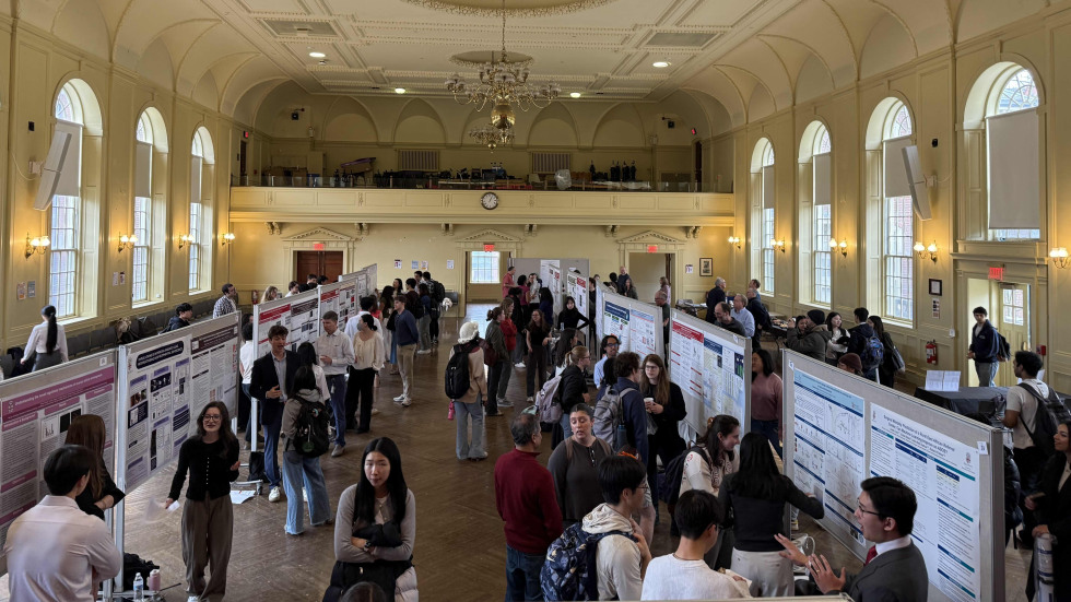 Students presenting posters during Session II in Alumnae Hall